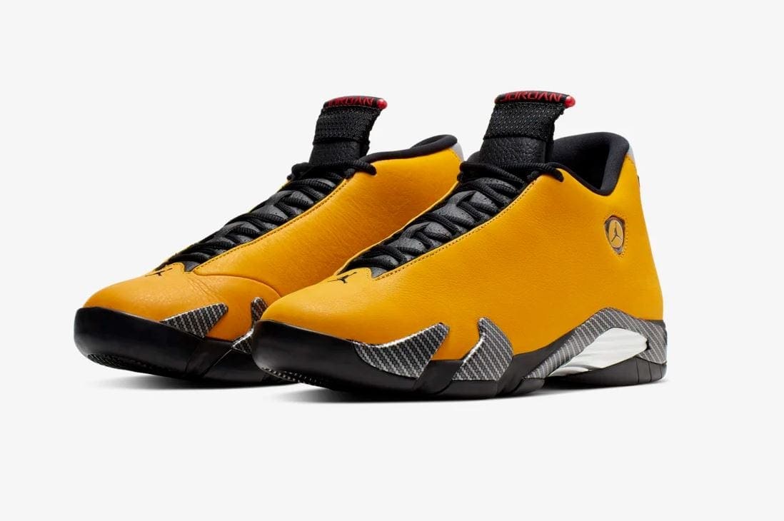 black and yellow jordans retro 14