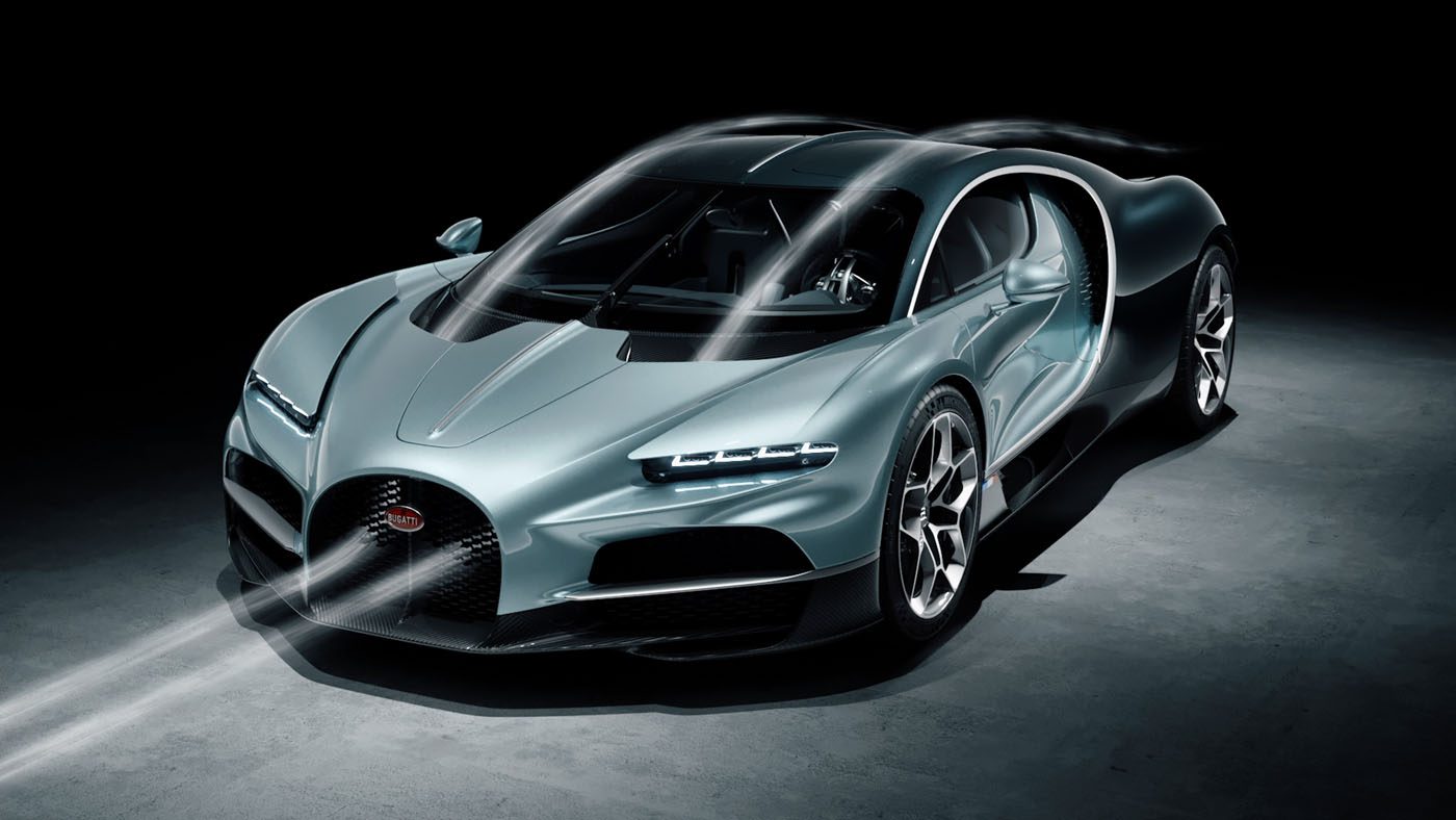 A sleek silver Bugatti sports car with mastered aerodynamics gleams against a dark background, showcasing modern headlights and shiny alloy wheels.