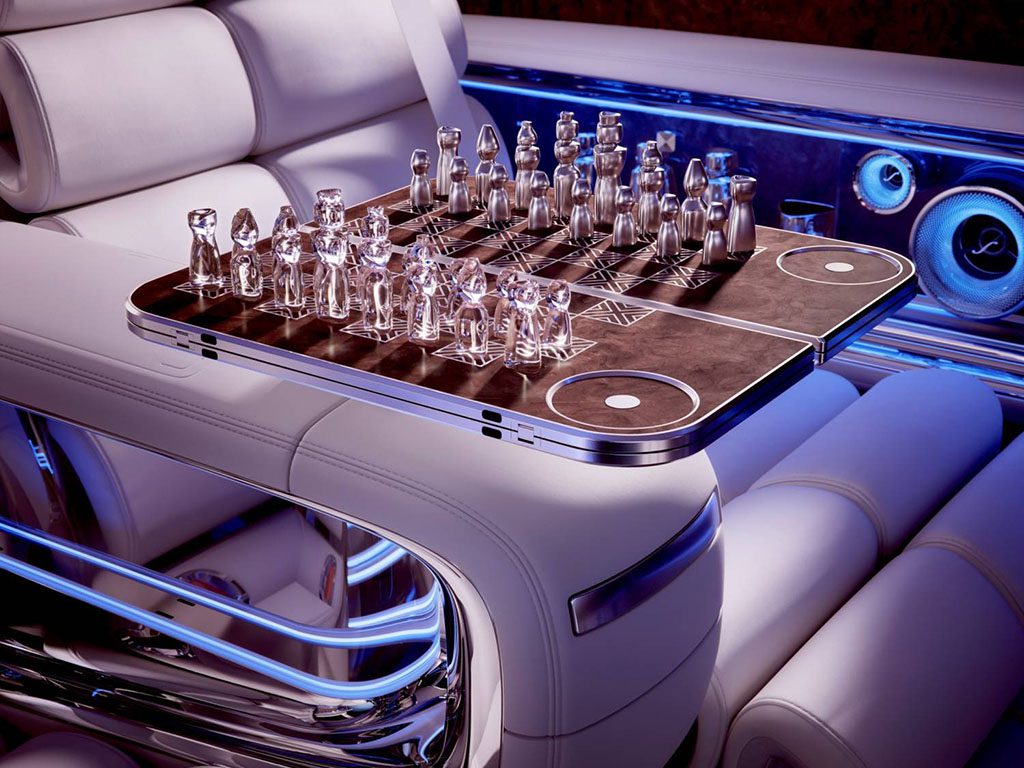 A luxury car interior features a modern chess set with transparent pieces on a sleek board resting on a leather armrest, illuminated by ambient blue lighting.