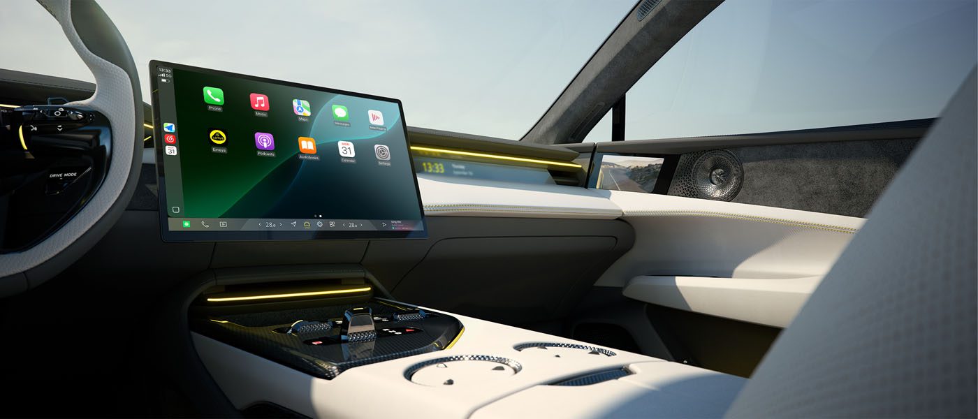 Modern car interior featuring a large central touchscreen display, digital controls, and white leather seats with yellow accents.