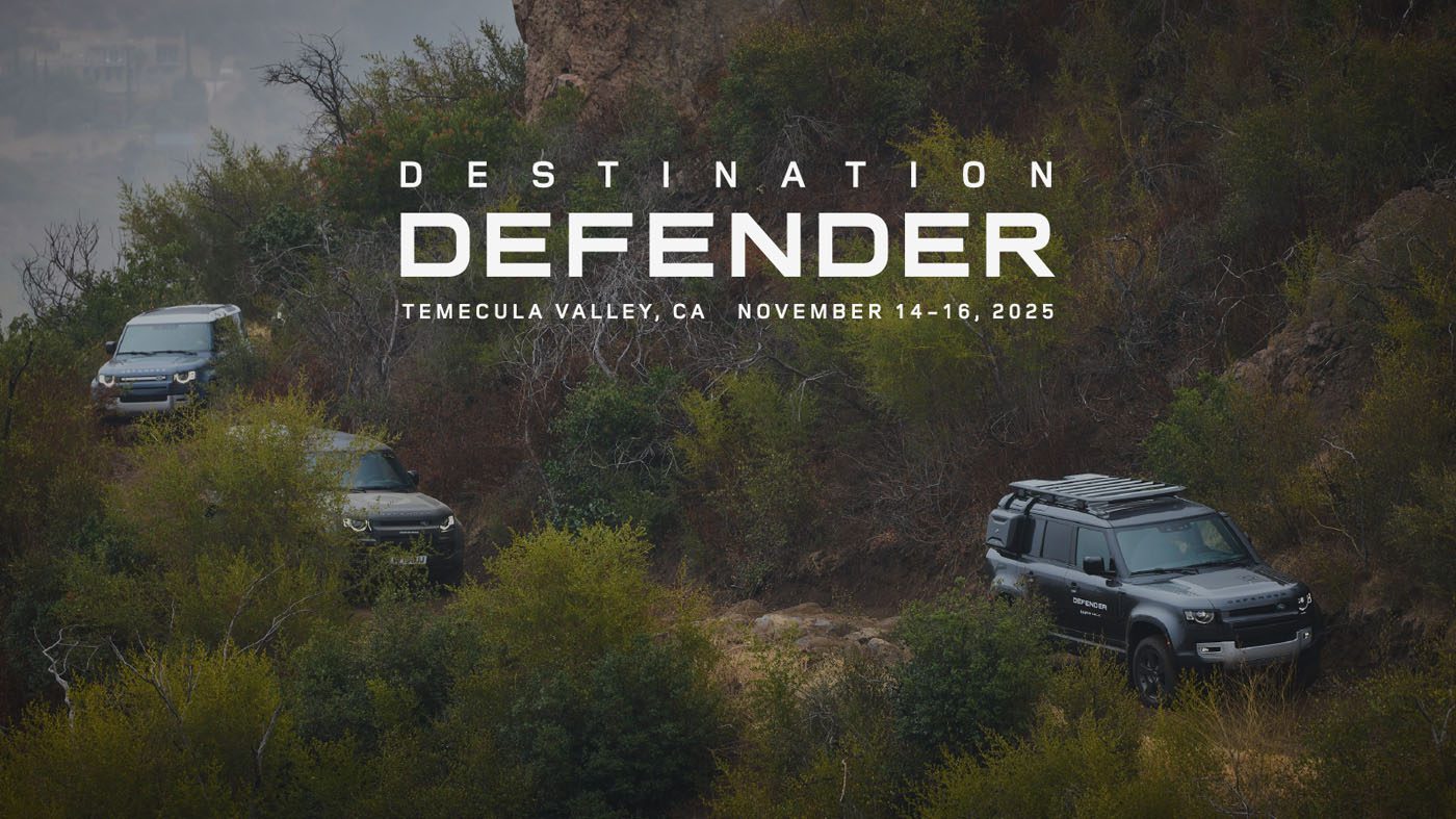 Three Land Rover Defenders navigate a rugged, bushy trail with text overlay: Destination Defender West, Nov. 14-16, Temecula Valley, California, 2025.