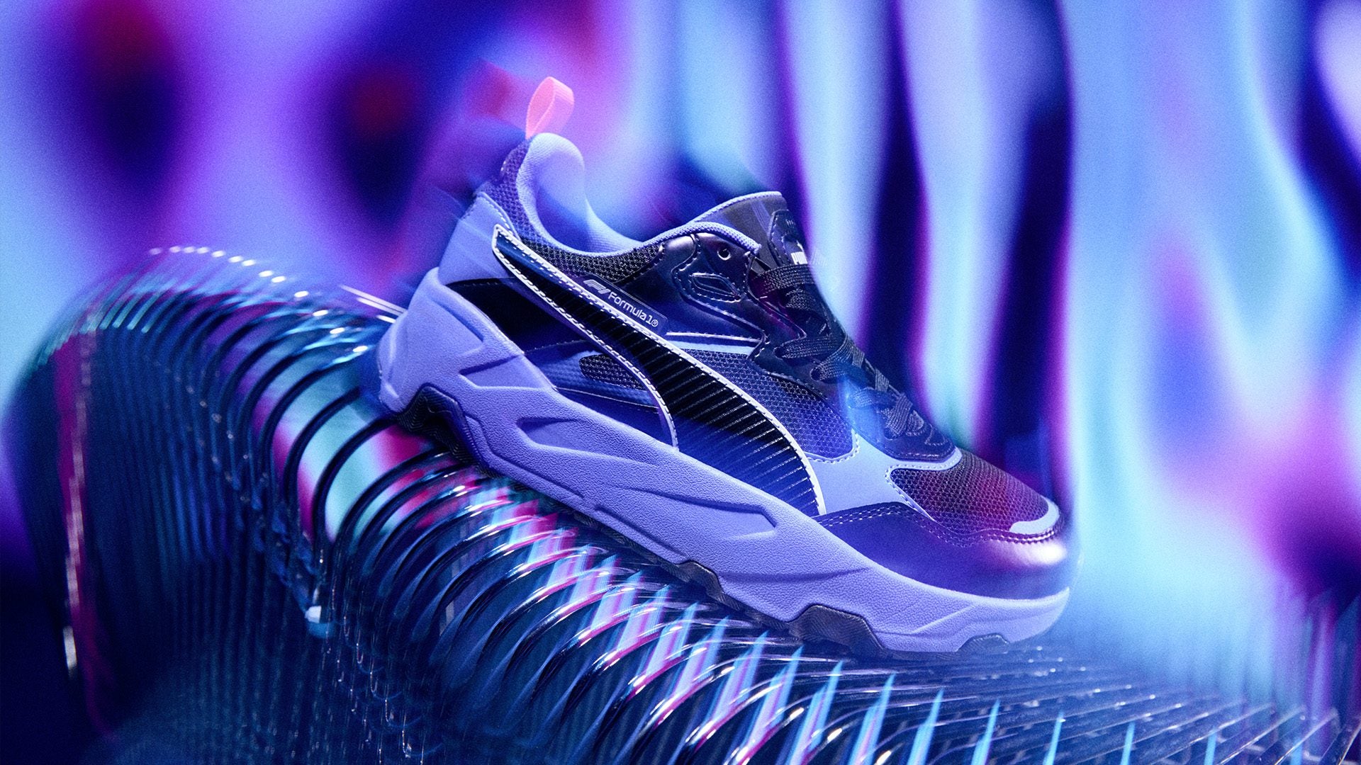 A purple high-top sneaker with black accents sits on a reflective surface, embodying the Neon Energy Collection vibe, surrounded by a vibrant, wavy blue and purple background reminiscent of the Las Vegas GP-Inspired spirit.