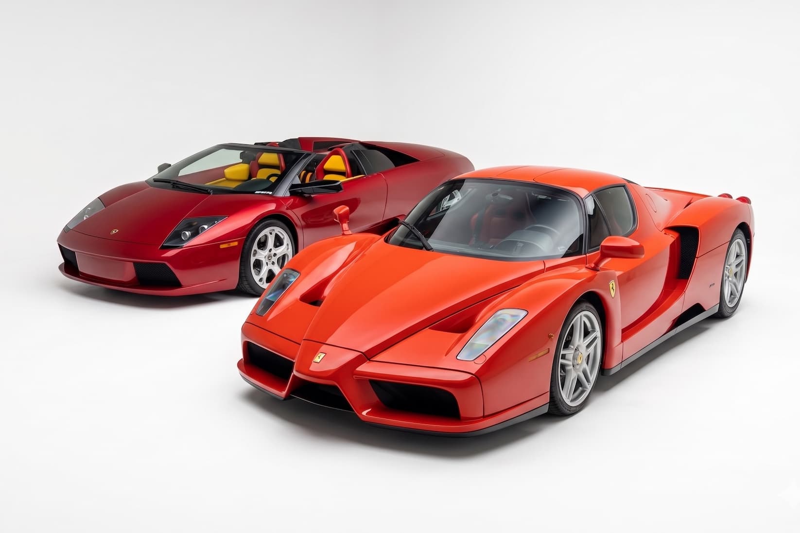 The REGISTRY Report: One-Off Rosso Dino Ferrari Enzo and Lamborghini Murciélago Roadster Set New World Records