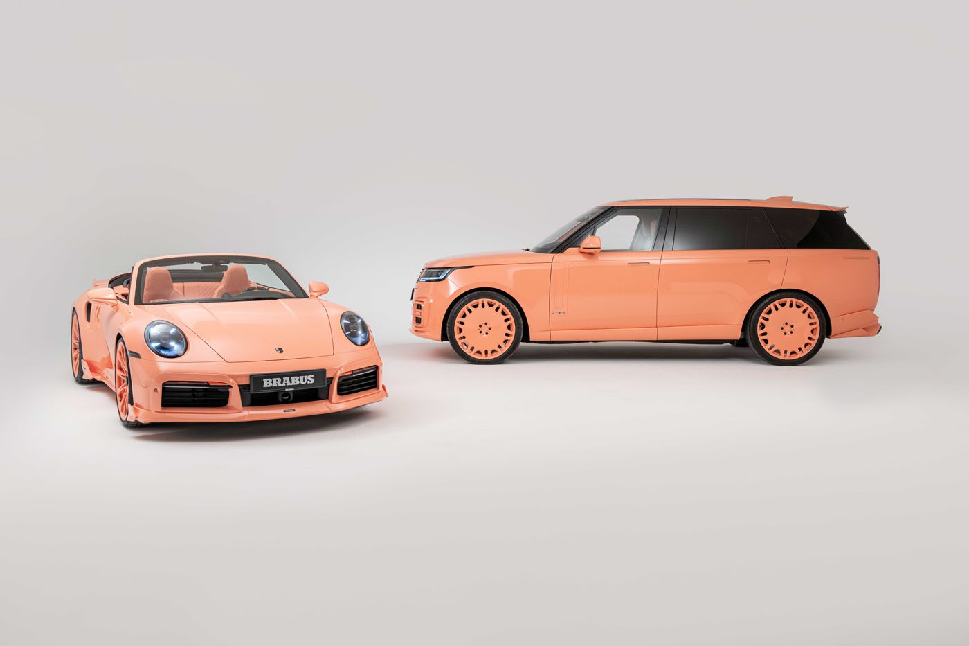 Two peach-colored luxury cars: a convertible sports car and an SUV, both from the exclusive 900 Peetch series, parked side by side on a light gray background.