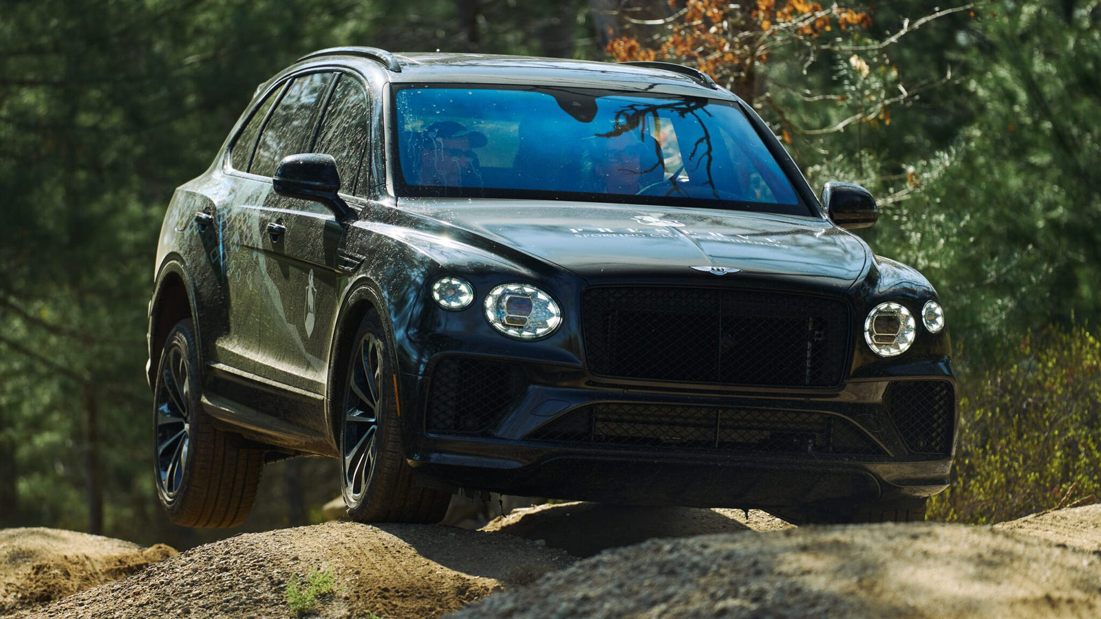 An image of a Bentley Bentayga off-roading.