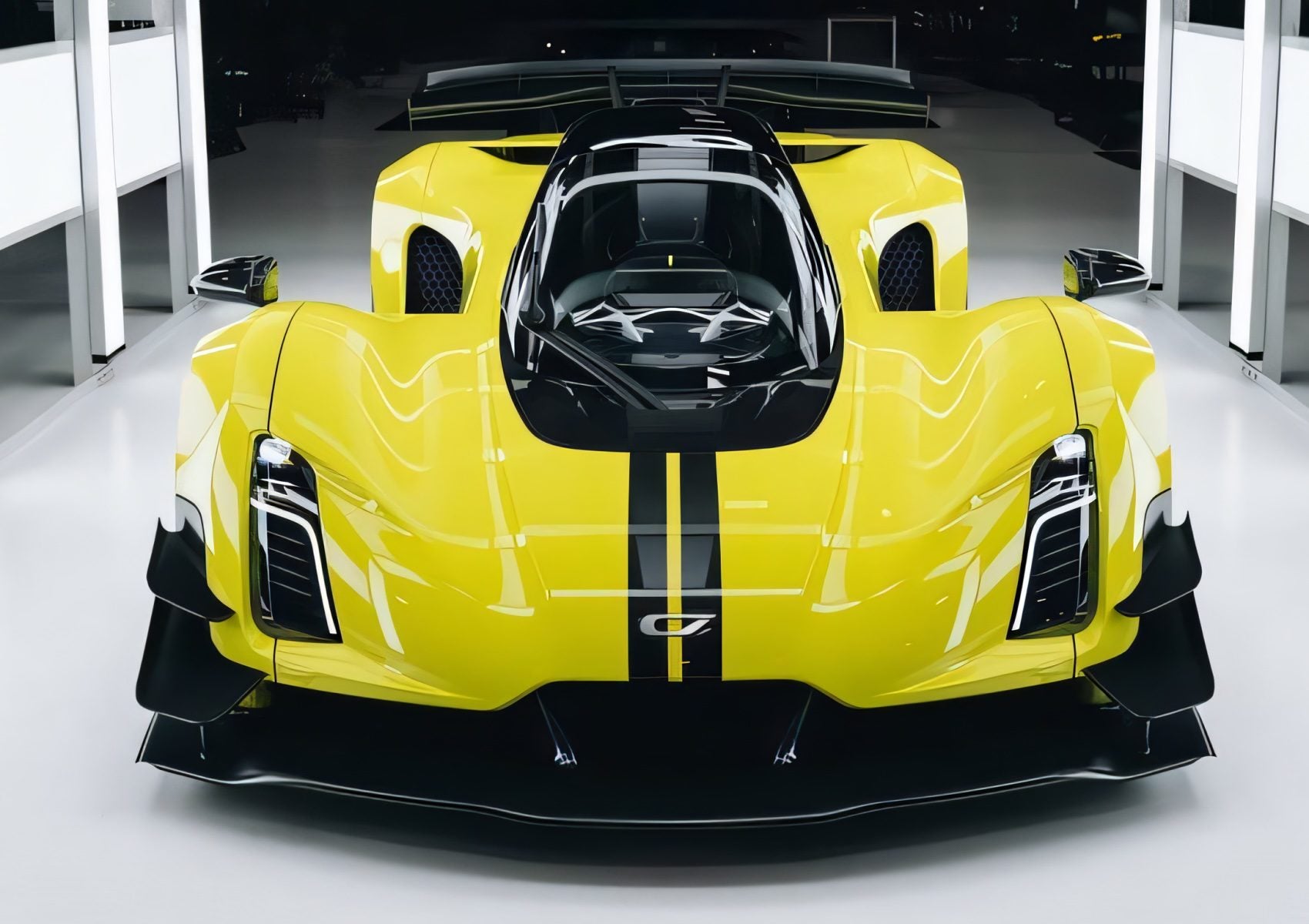 A bright yellow, high-performance Czinger C21 with black stripes is displayed in a brightly lit, modern showroom as Prestige Imports delivers this bespoke masterpiece in Miami.