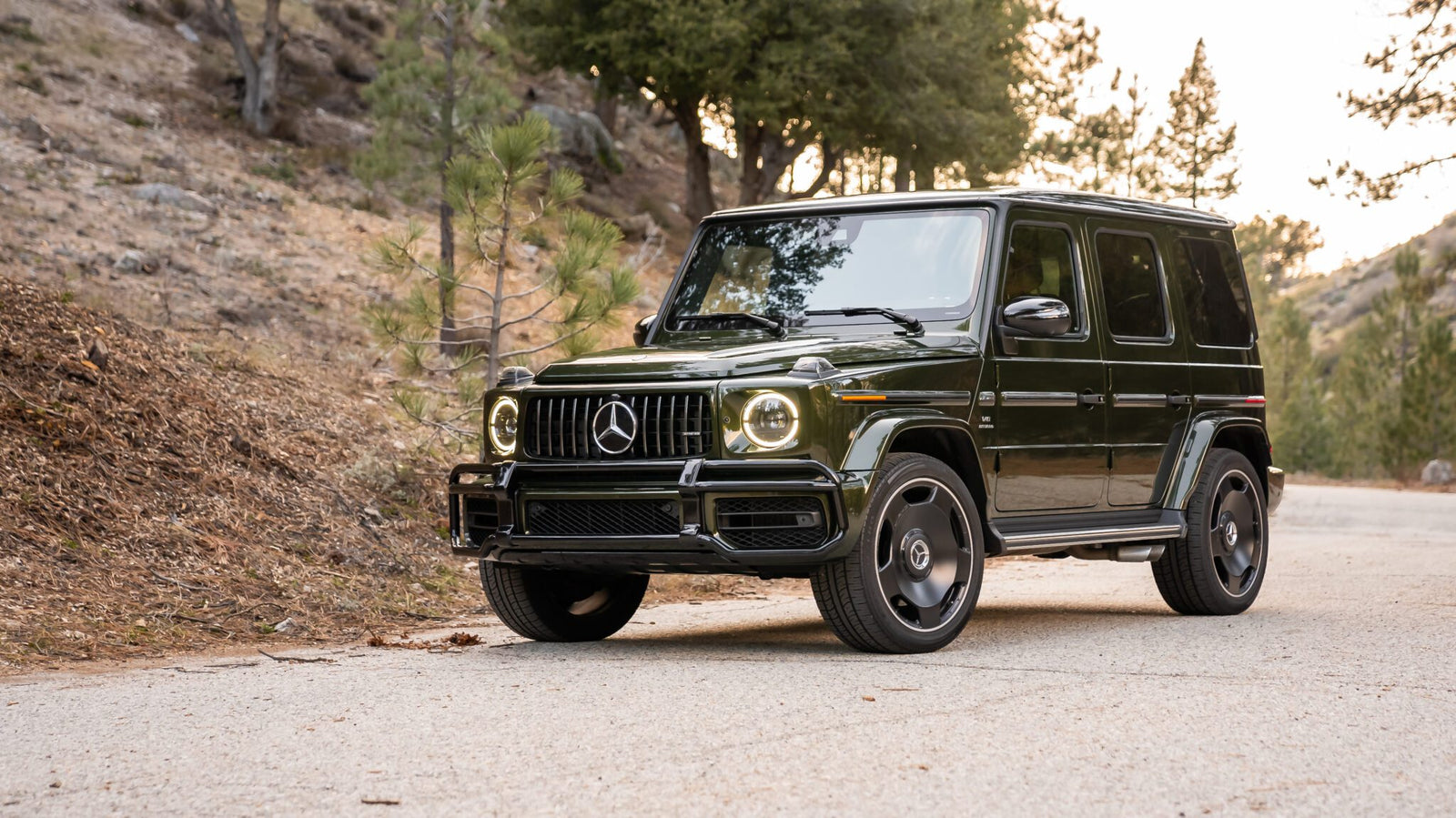 An image of a Mercedes-AMG G63 parked outdoors.