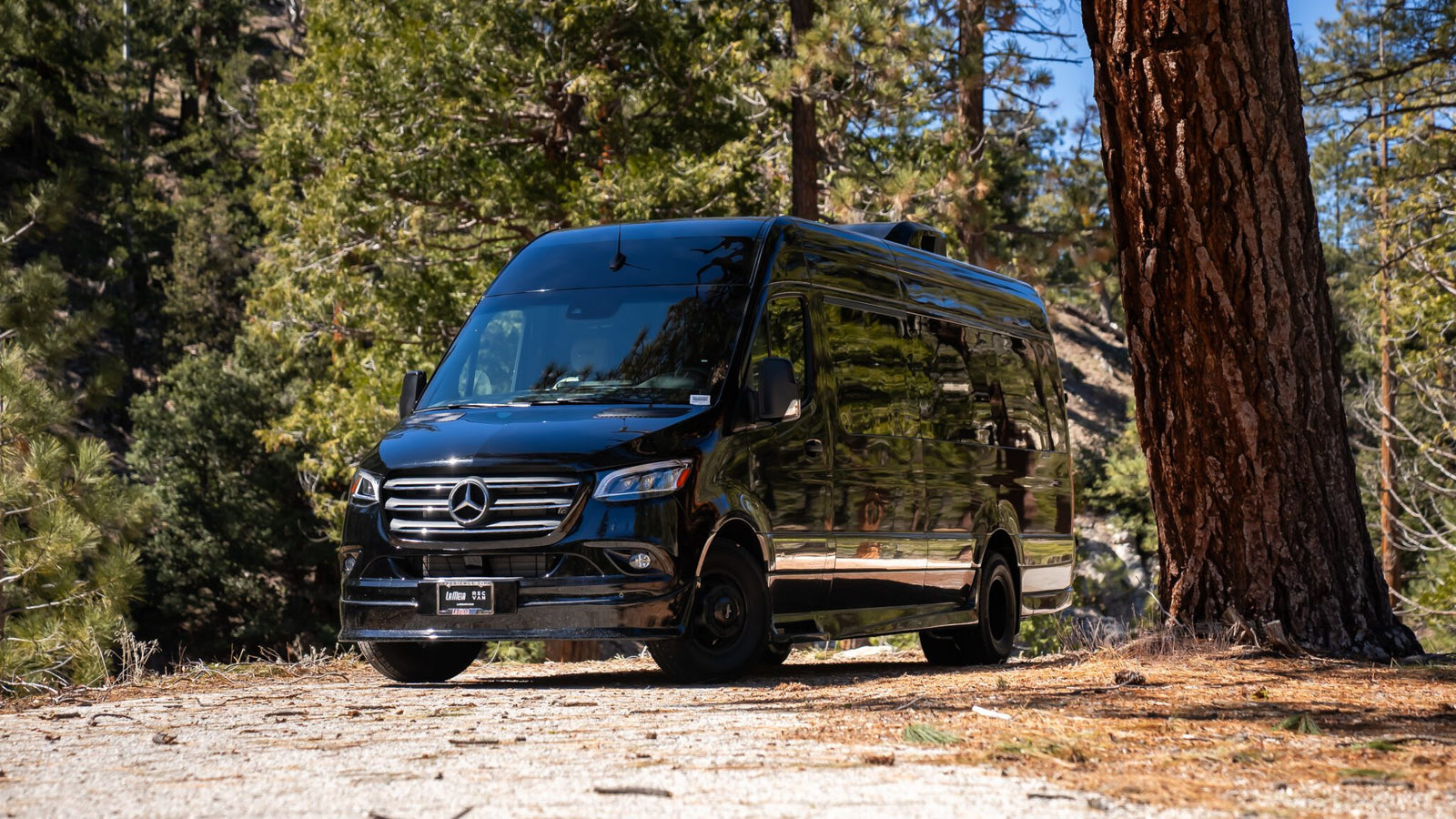 An image of a Grech RV parked outdoors.