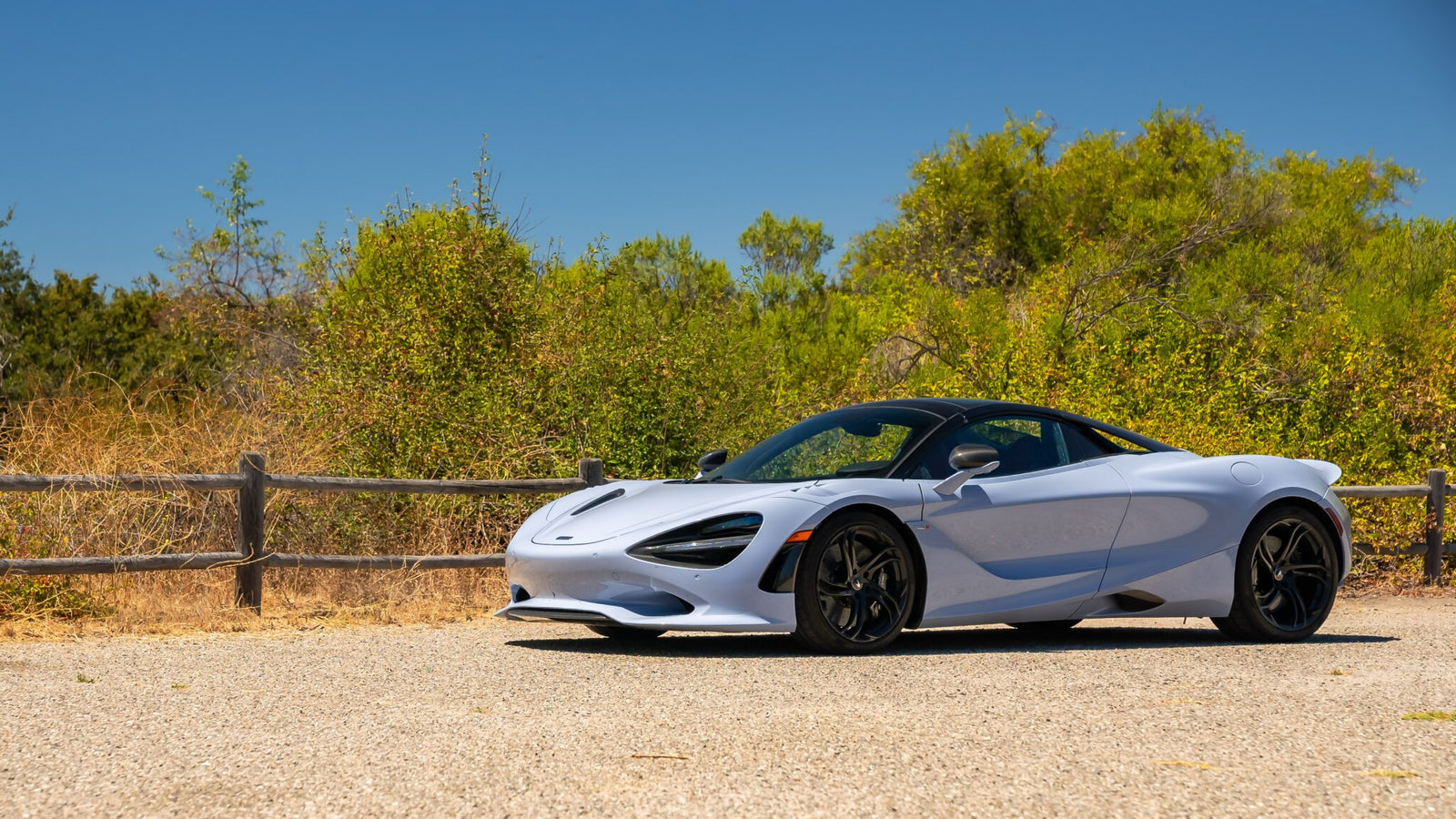 An image of a McLaren 750S Spider parked outdoors.