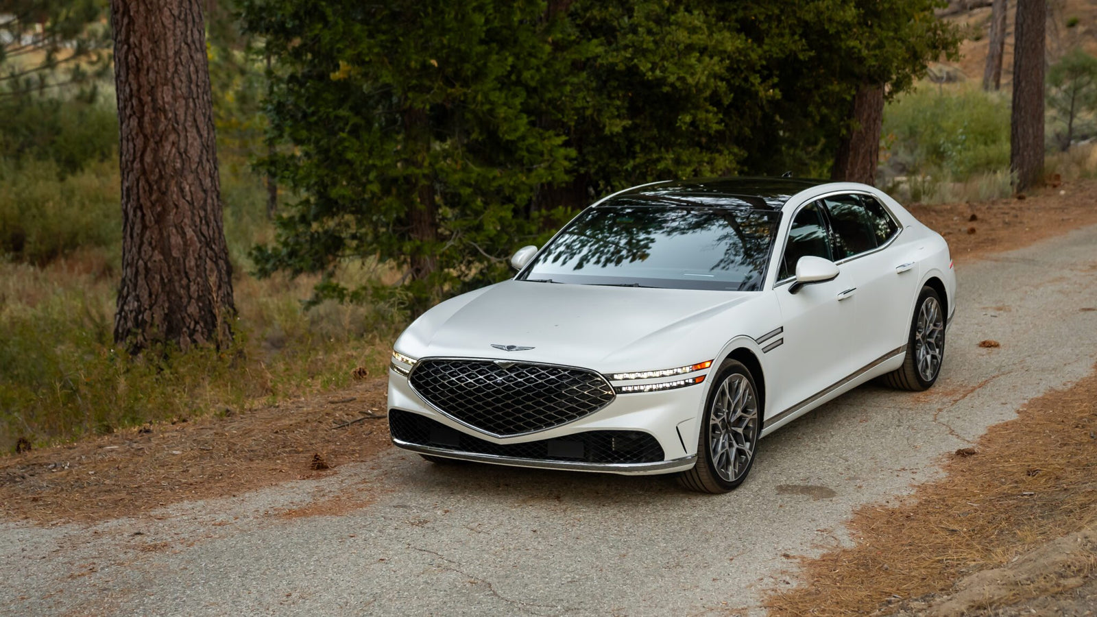 An image of a 2024 Genesis G90 parked outdoors.