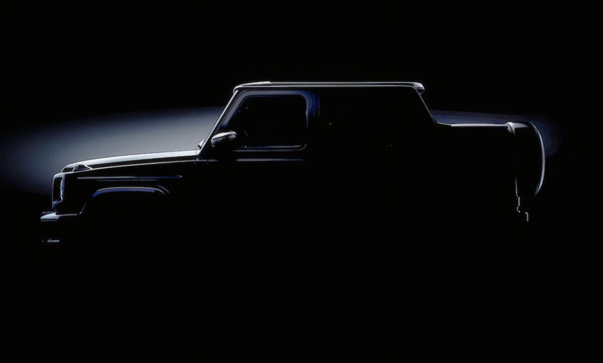 A pickup truck is shown in silhouette against a dark background, echoing the intrigue as Mercedes teases the G-Class Cabriolet revival with four doors instead of two, subtle lighting highlighting its outline and features.
