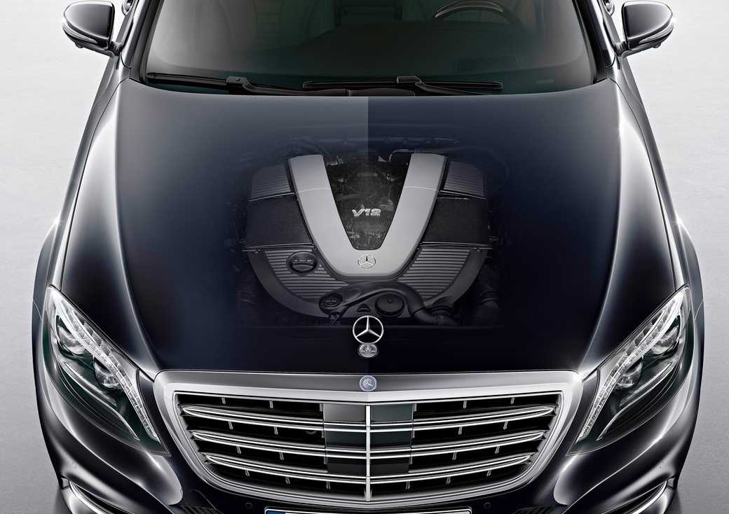 A 2030 Mercedes-Benz car with a transparent hood effect reveals the powerful V12 engine underneath.