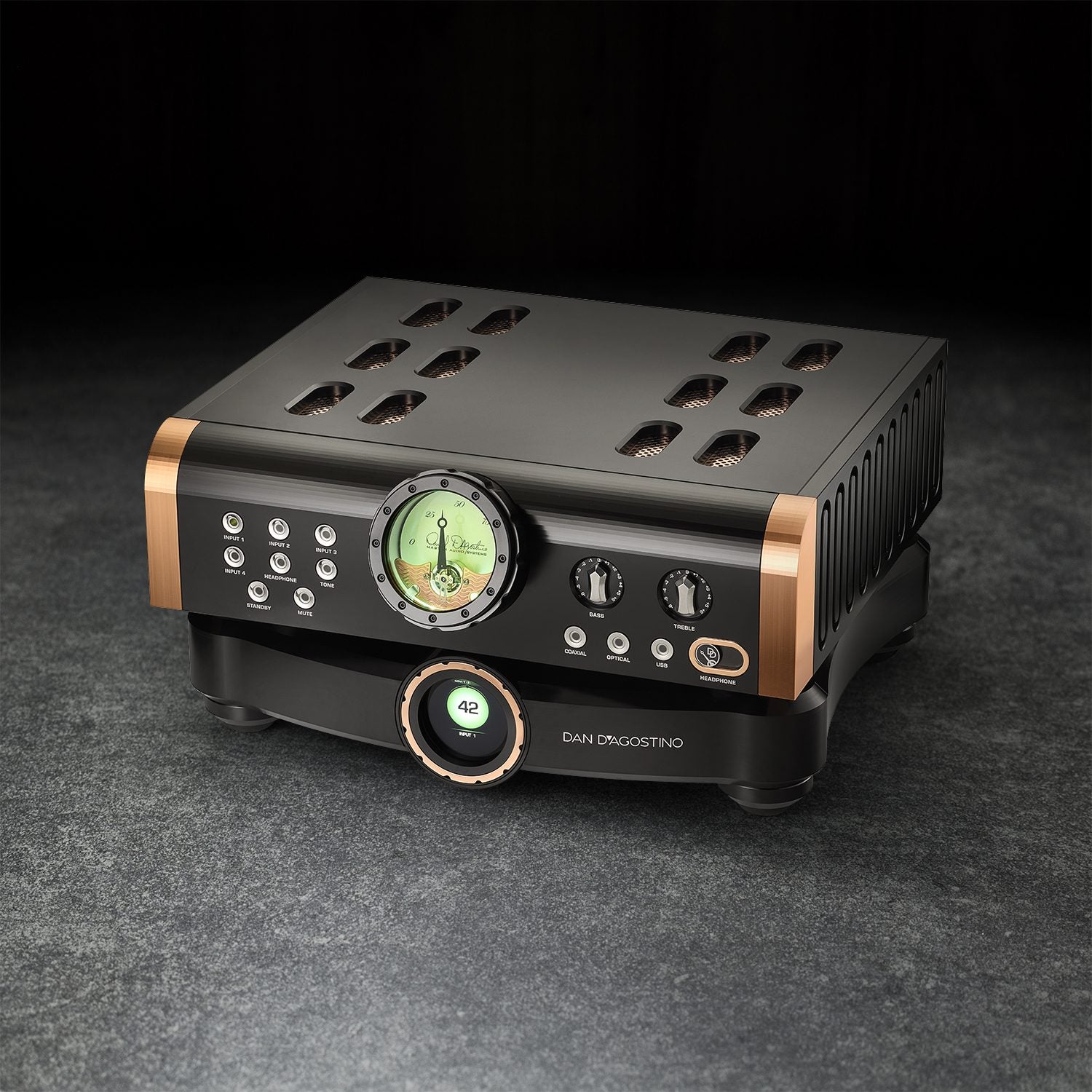 The Master Audio Systems integrated amplifier boasts a metallic finish, featuring a circular gauge, control knobs, and vents on top. Perfect for audiophiles who appreciate style and performance in one sophisticated package.