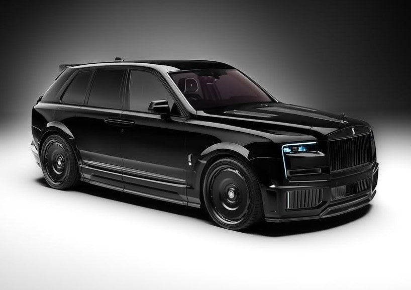 A black Rolls-Royce Cullinan luxury SUV with tinted windows, carbon fiber widebody, 24-inch black rims, and blue accent headlights is parked on a plain white background.