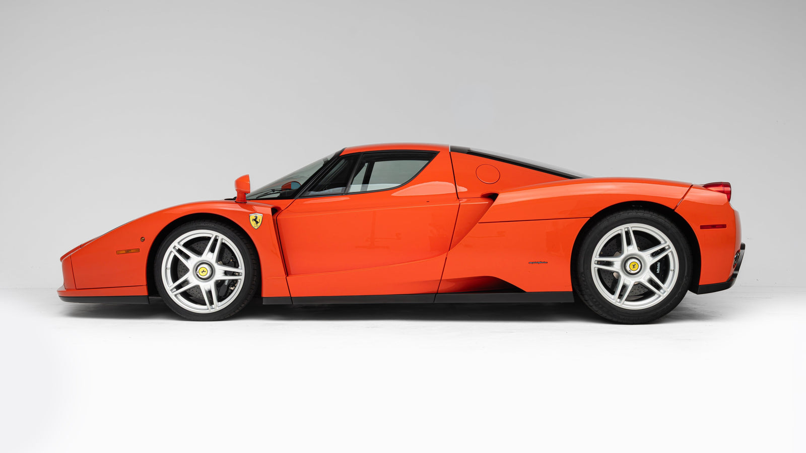New Record: 1-of-1 Rosso Dino Ferrari Enzo Closes on duPont REGISTRY Live at $13.01 million