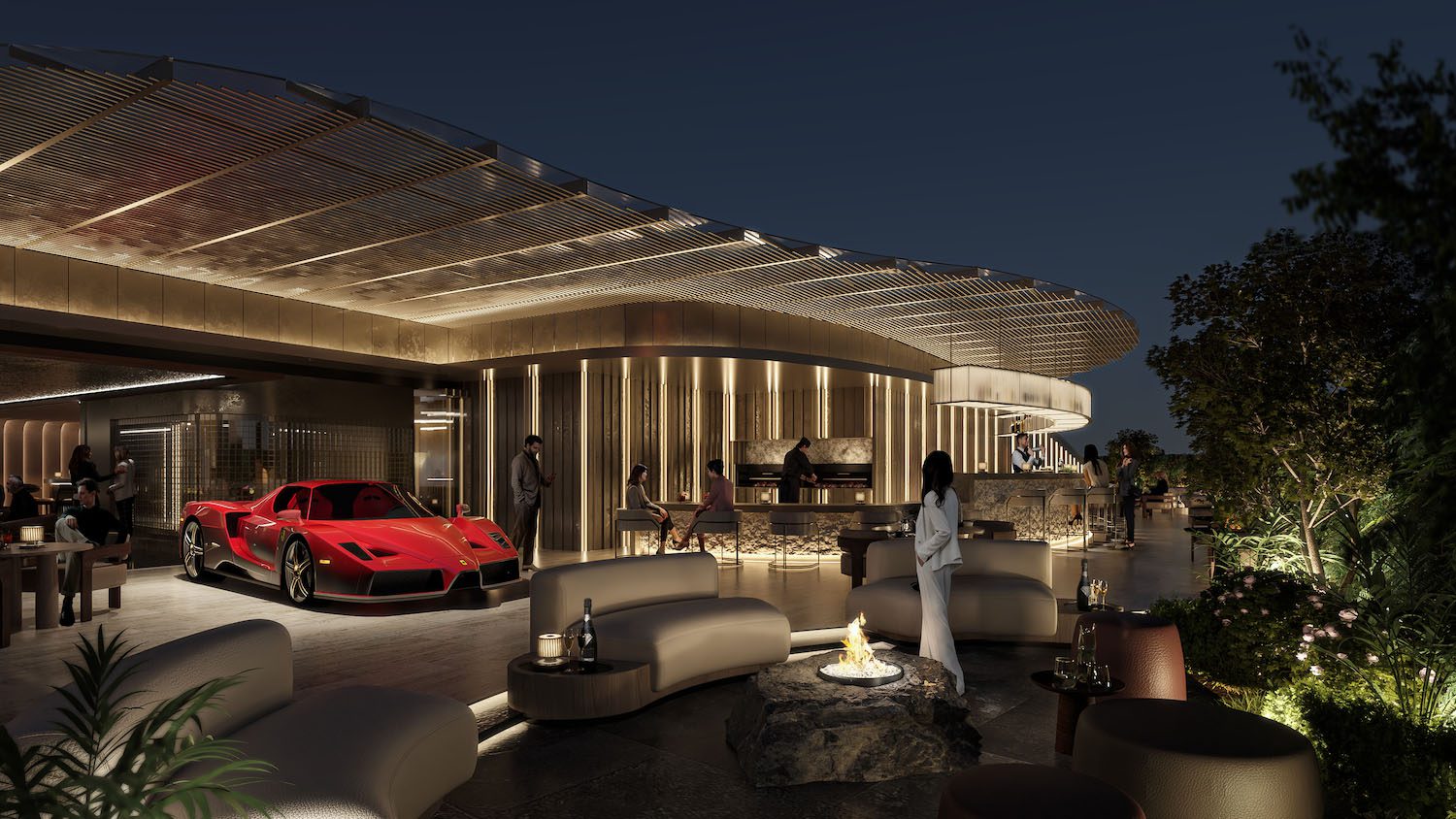 Outdoor luxury lounge at night with modern seating, a central fire pit, and a red sports car from the duPont REGISTRY Group parked as guests socialize near PRIVÉ Sofia’s contemporary building illuminated with warm lighting.