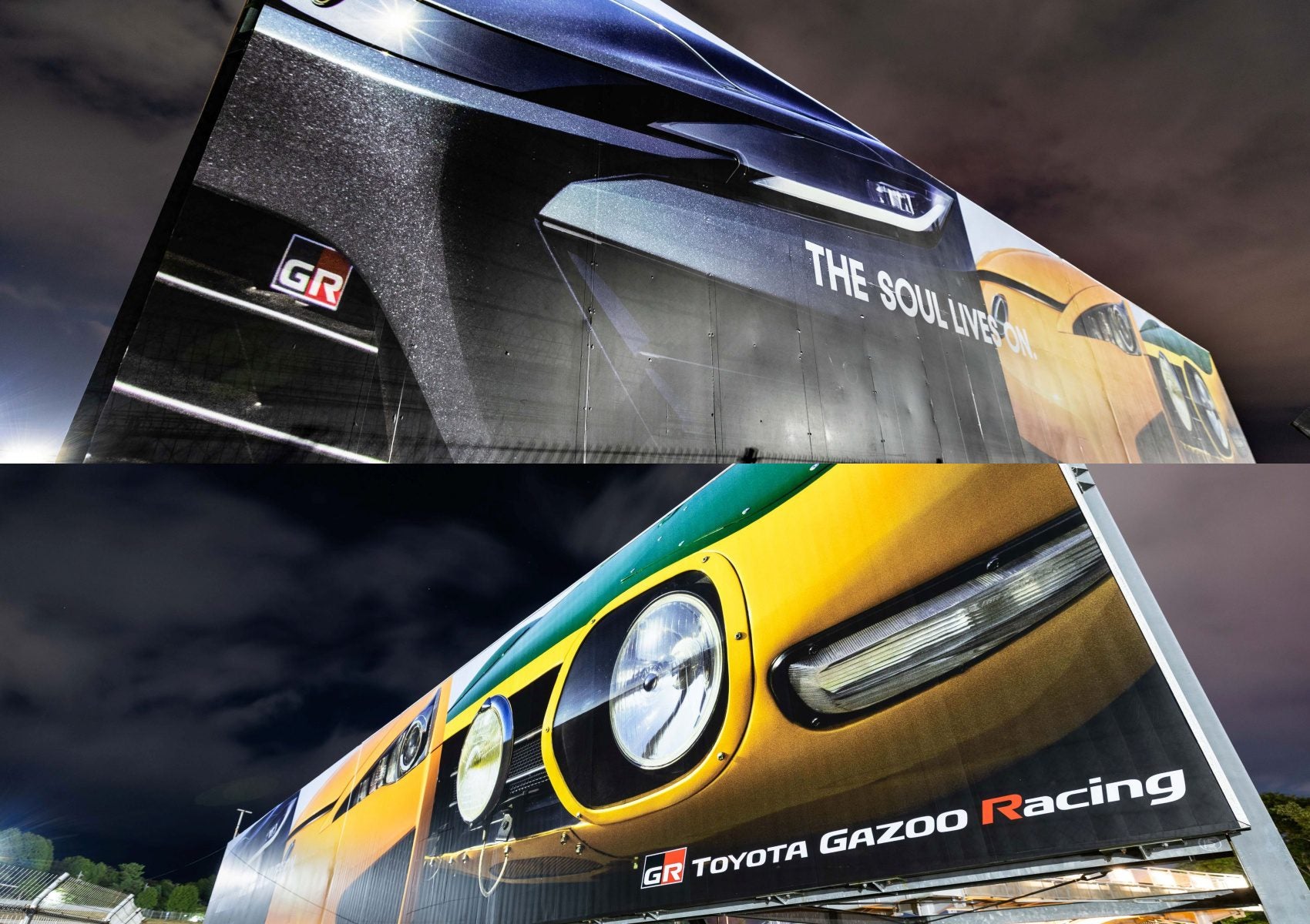 Two billboards at night display close-up images of Toyota sports cars with "GR" and "Toyota Gazoo Racing" branding, hinting at a Toyota teaser for a possible new Toyota halo car inspired by Fuji Speedway.