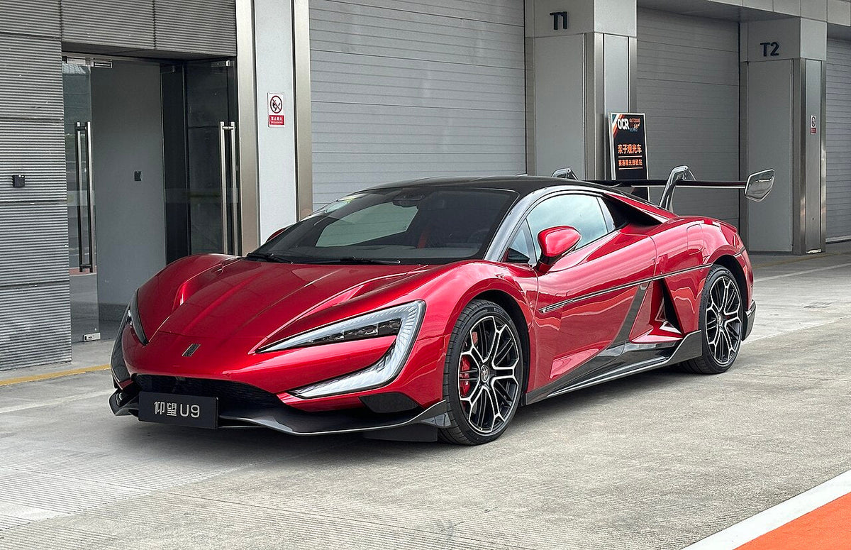 The Yangwang U9 electric supercar by BYD in a high-gloss finish, representing Chinese luxury automotive engineering.