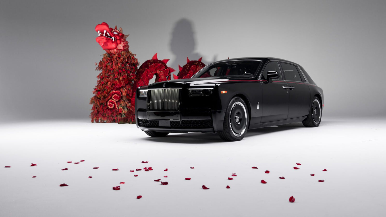 An image of a Rolls-Royce Phantom in a studio.