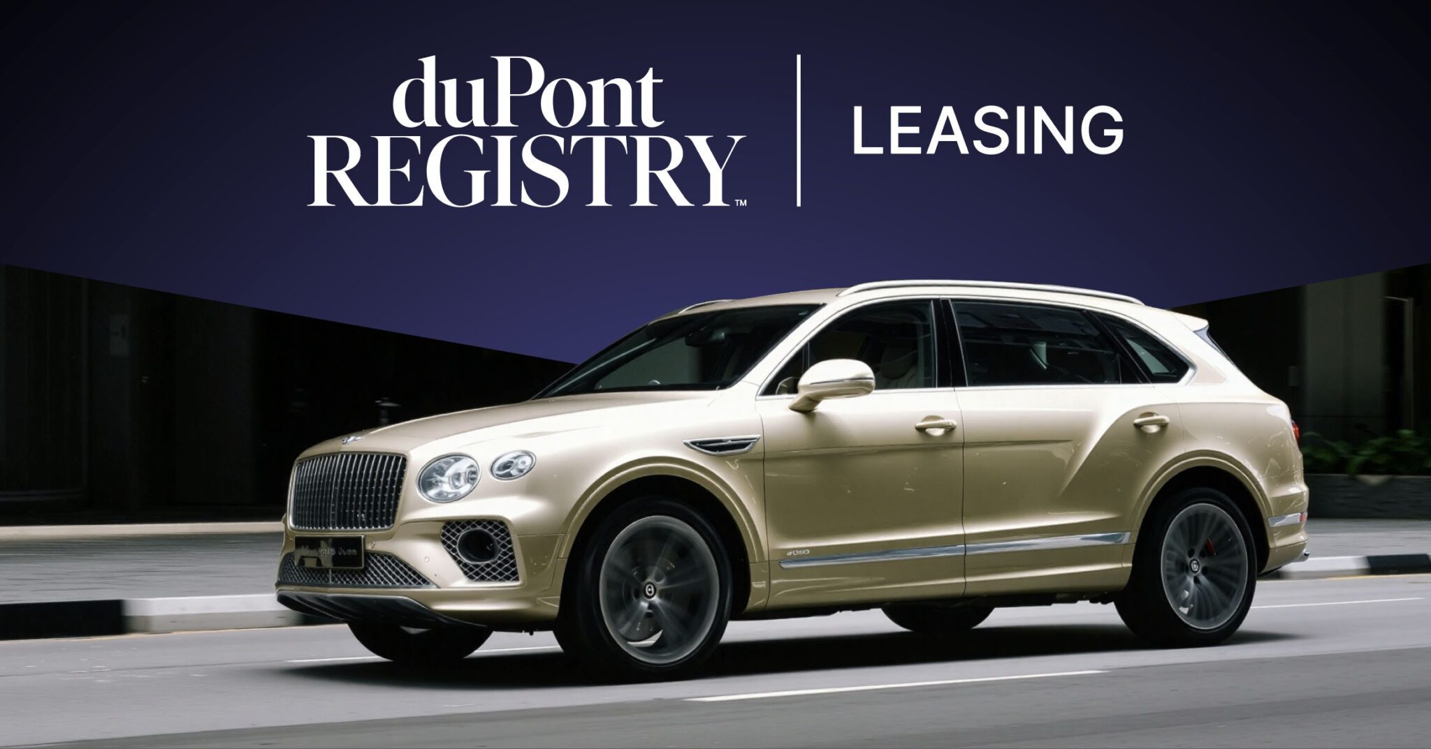 A gold luxury SUV drives in front of a dark blue background with "duPont Registry Leasing" text displayed above, highlighting exceptional car leasing options for exotic vehicles.
