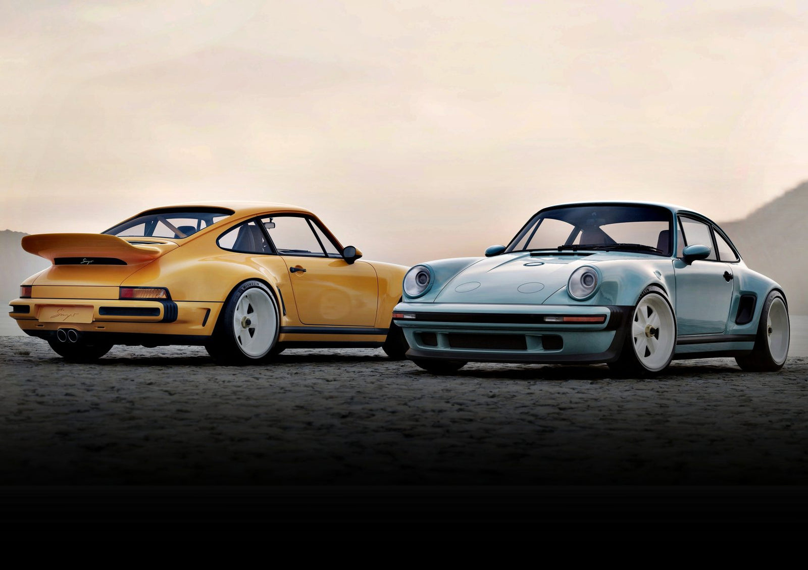Two classic Porsche 911 cars, reimagined by a California-based singer, sit side by side—one yellow, one light blue—unveiled as the latest Carrera Coupes at Goodwood against a hazy sky backdrop.