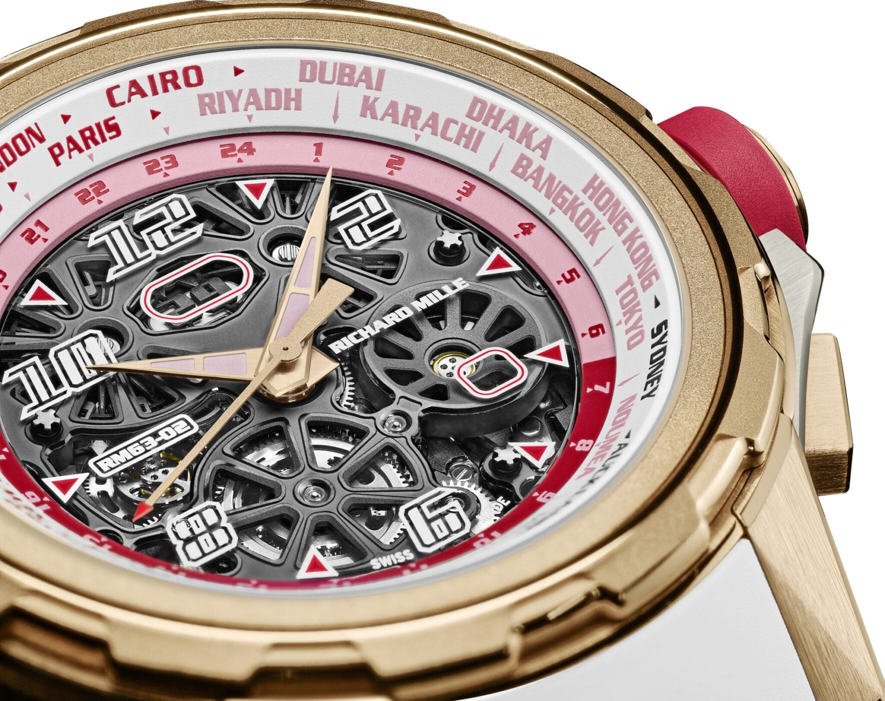 Close-up of a Richard Mille RM 63-02 luxury watch with a skeleton dial, red and white accents, and multiple city names around the bezel, showcasing its Automatic Worldtimer functionality.