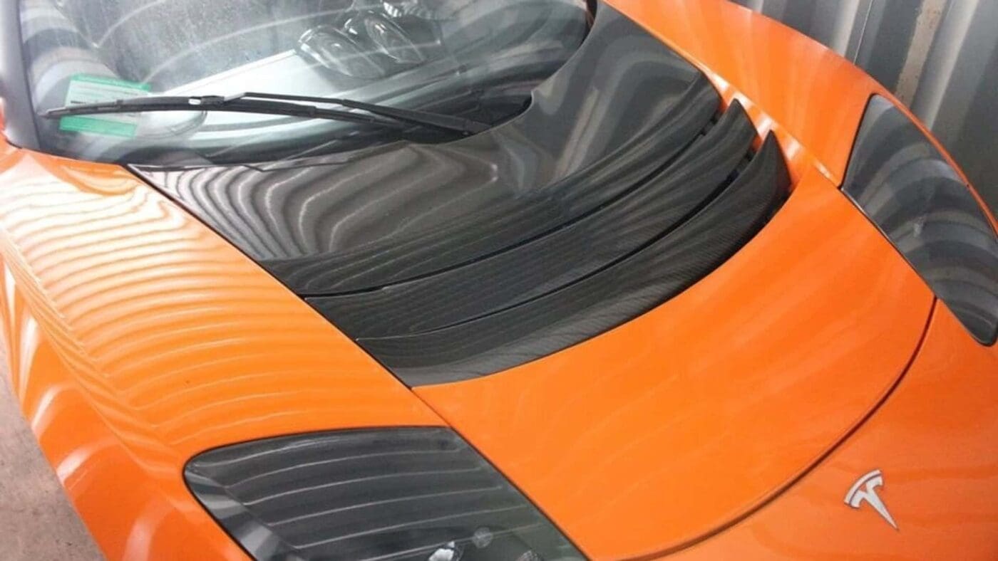 three 0 mile tesla roadsters found after 13 years.jpg