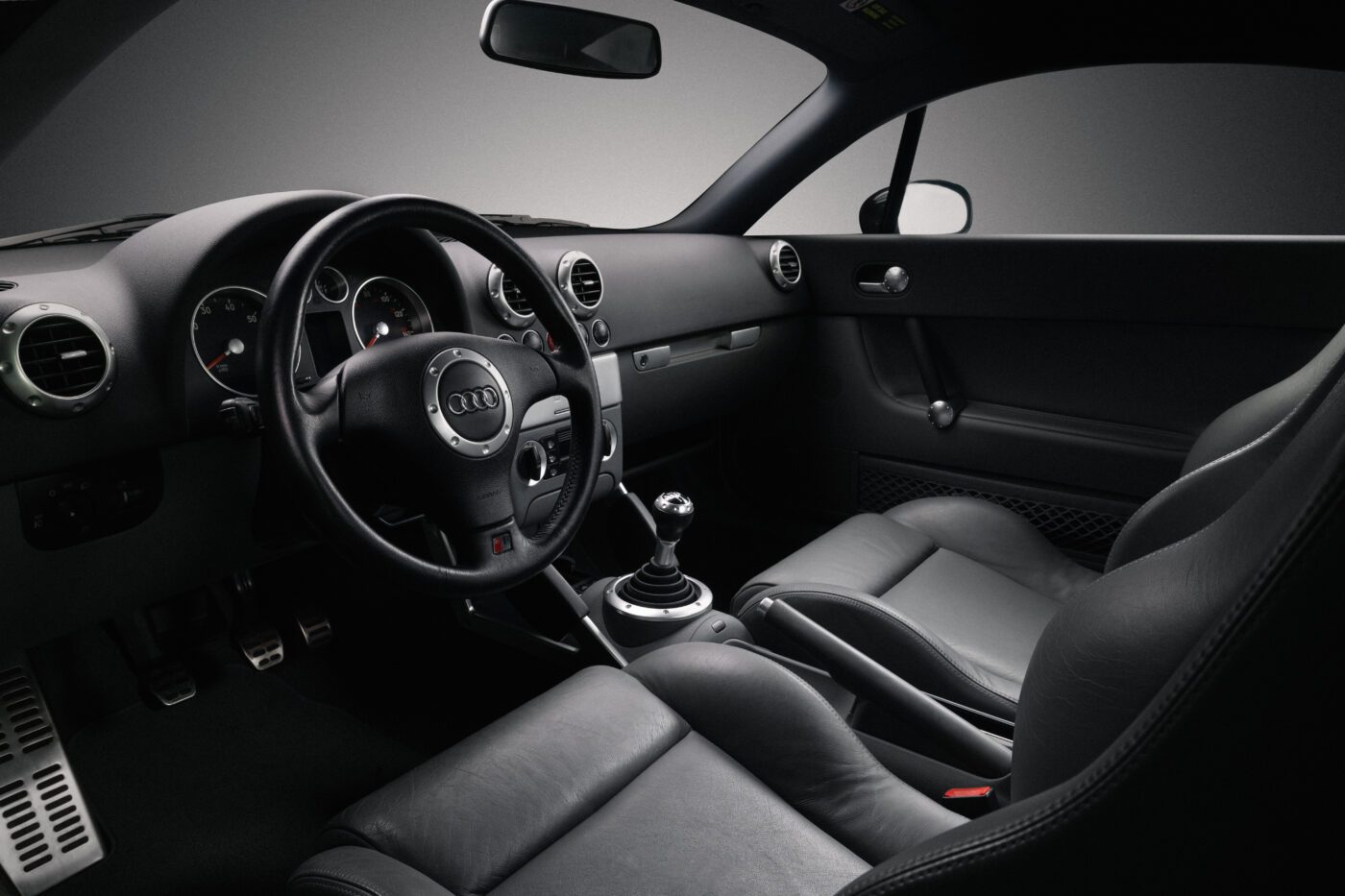An image of a black leather interior shot in a studio.