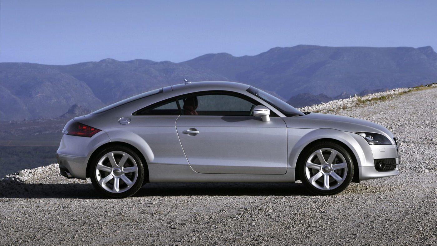 A silver Audi TT parked outdoors.