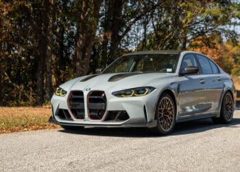 An image of a 2024 BMW M3 CS parked outdoors.