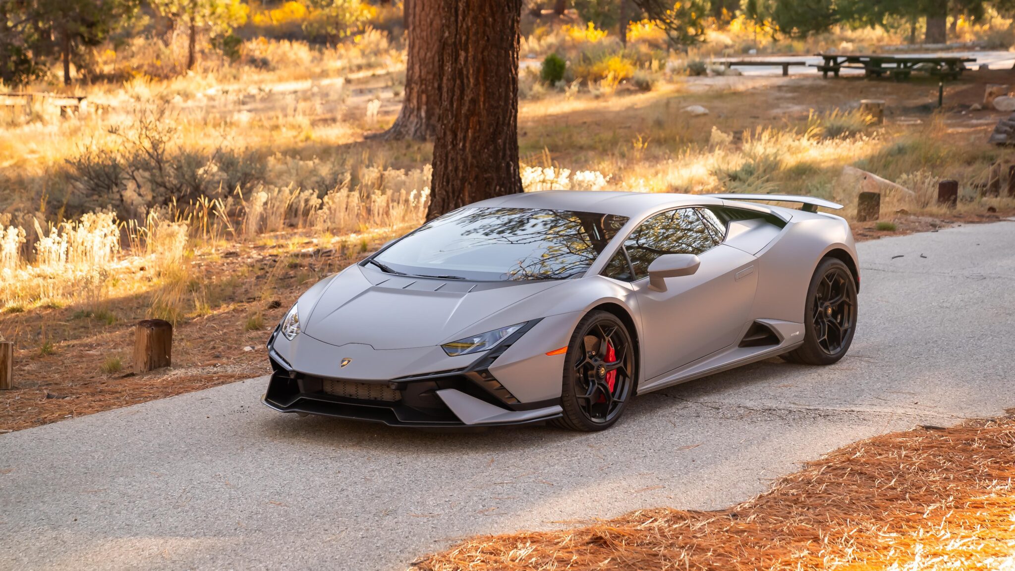 An image of a Lamborghini Huracan Tecnica parked outdoors.