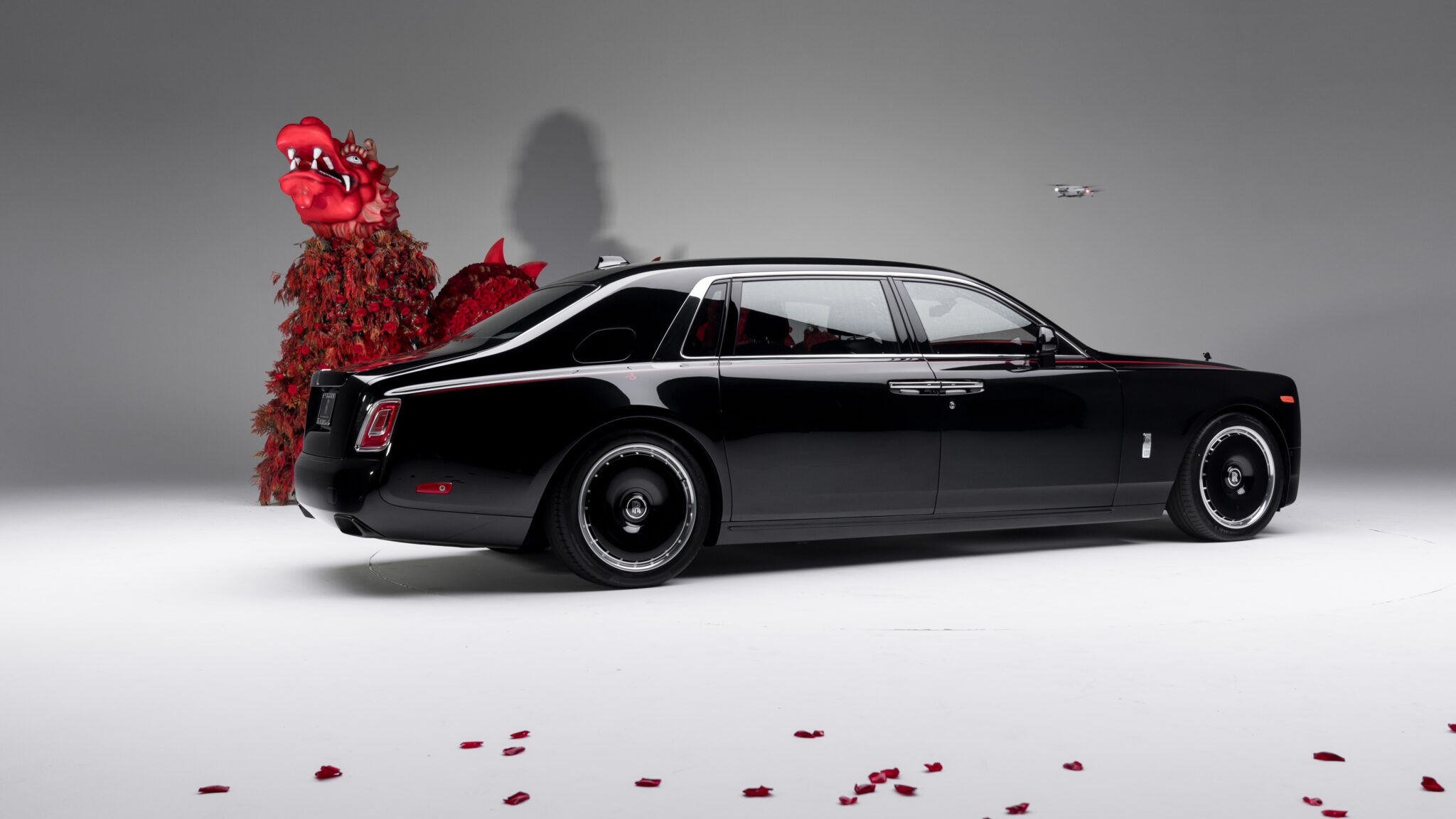 An image of a Rolls-Royce Phantom in a studio.