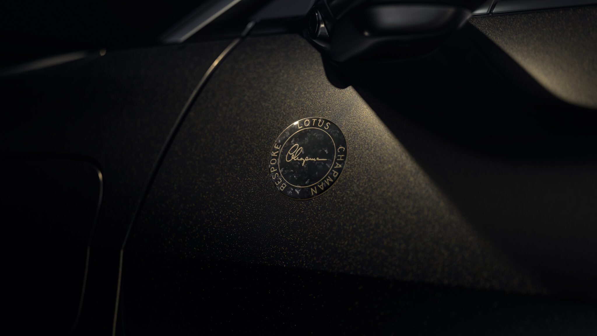 Lotus Chapman Bespoke Eletre Bespoke black gold badge detail