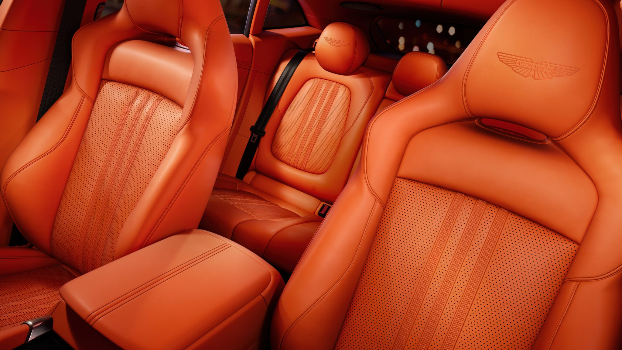 An image of a car's orange interior.