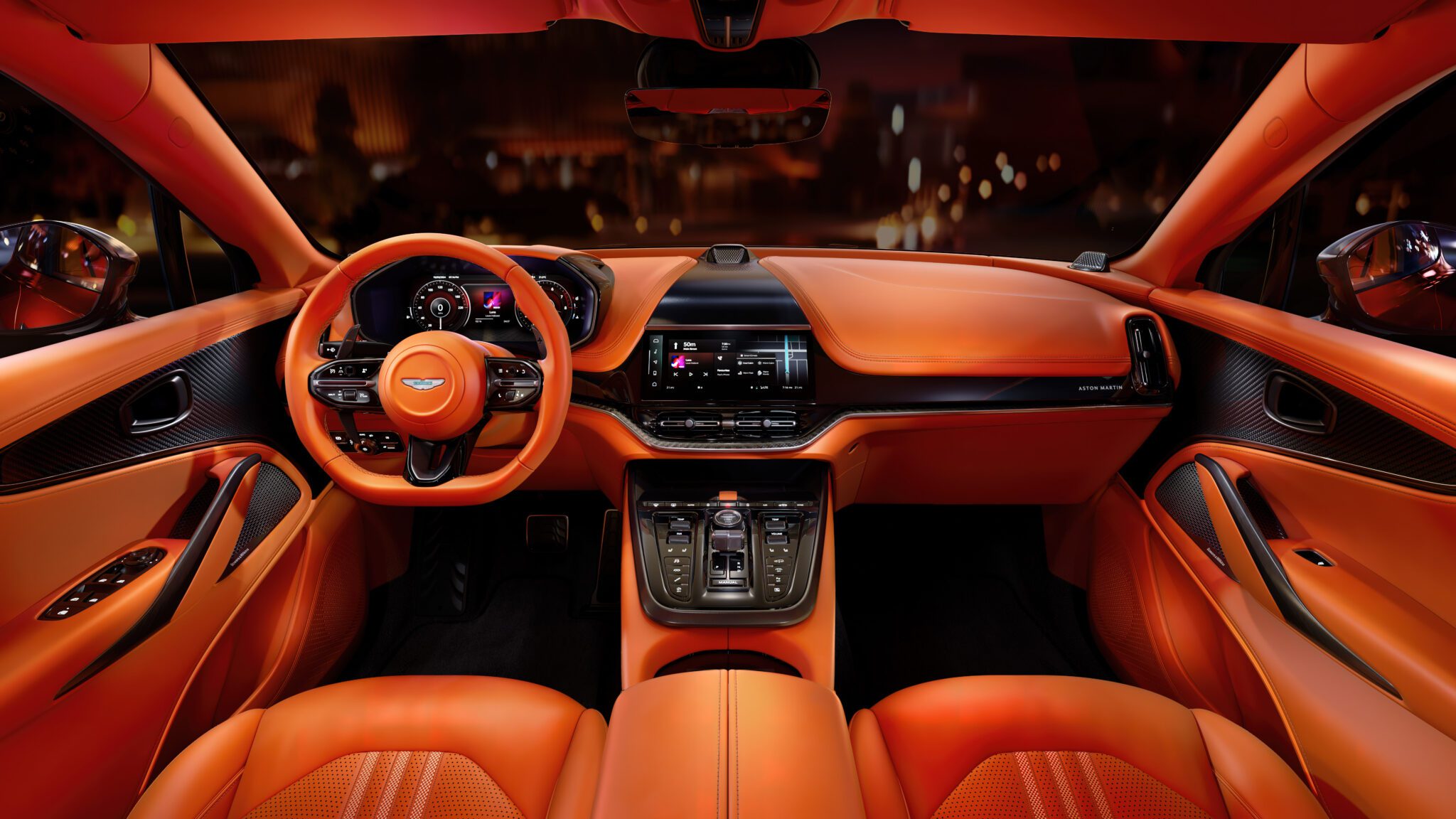 An image of a car's orange leather interior.