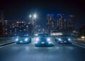 Aston Martin models in Toyko nightscape