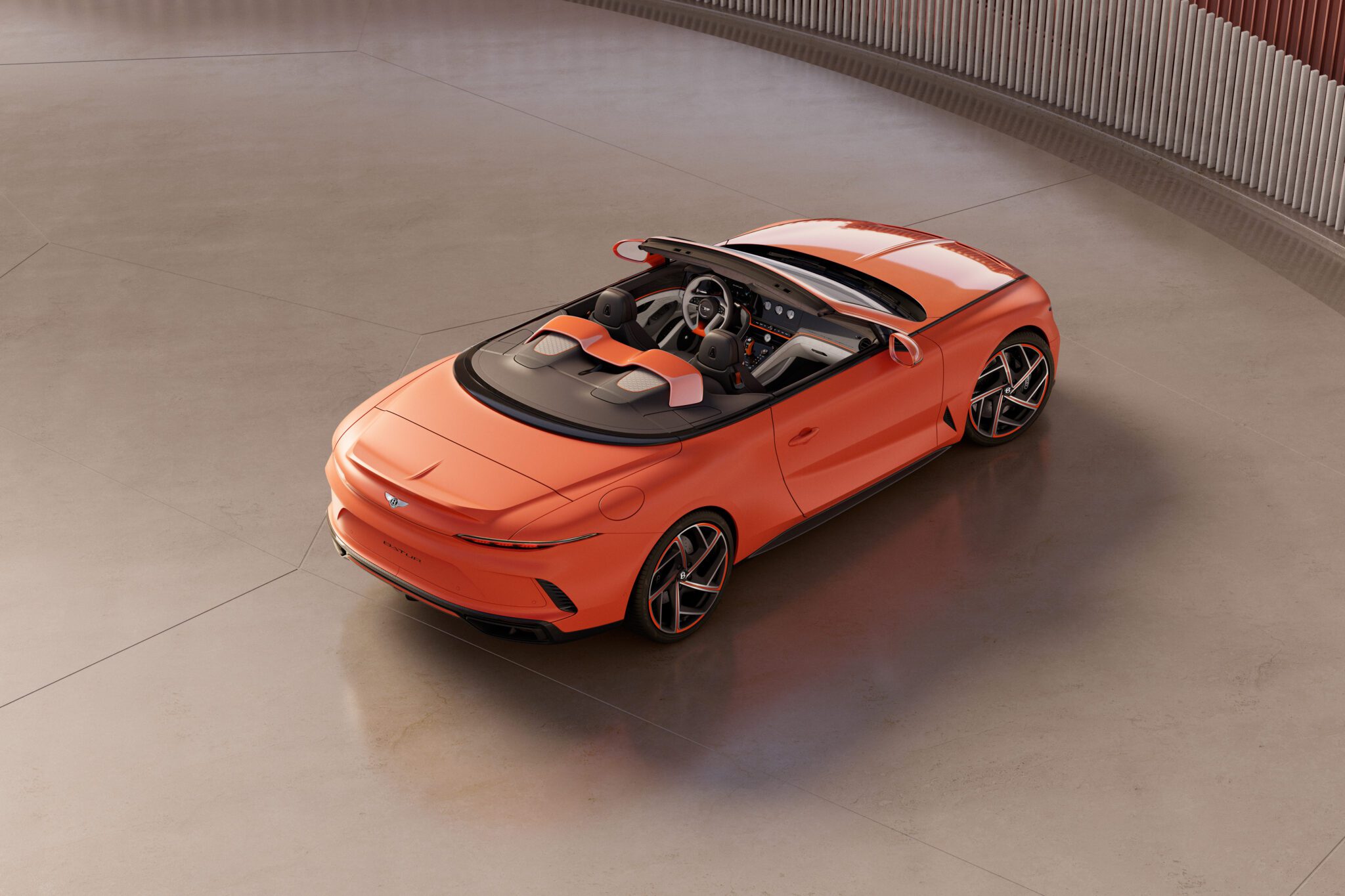 An image of a Bentley Batur Convertible parked in a studio.