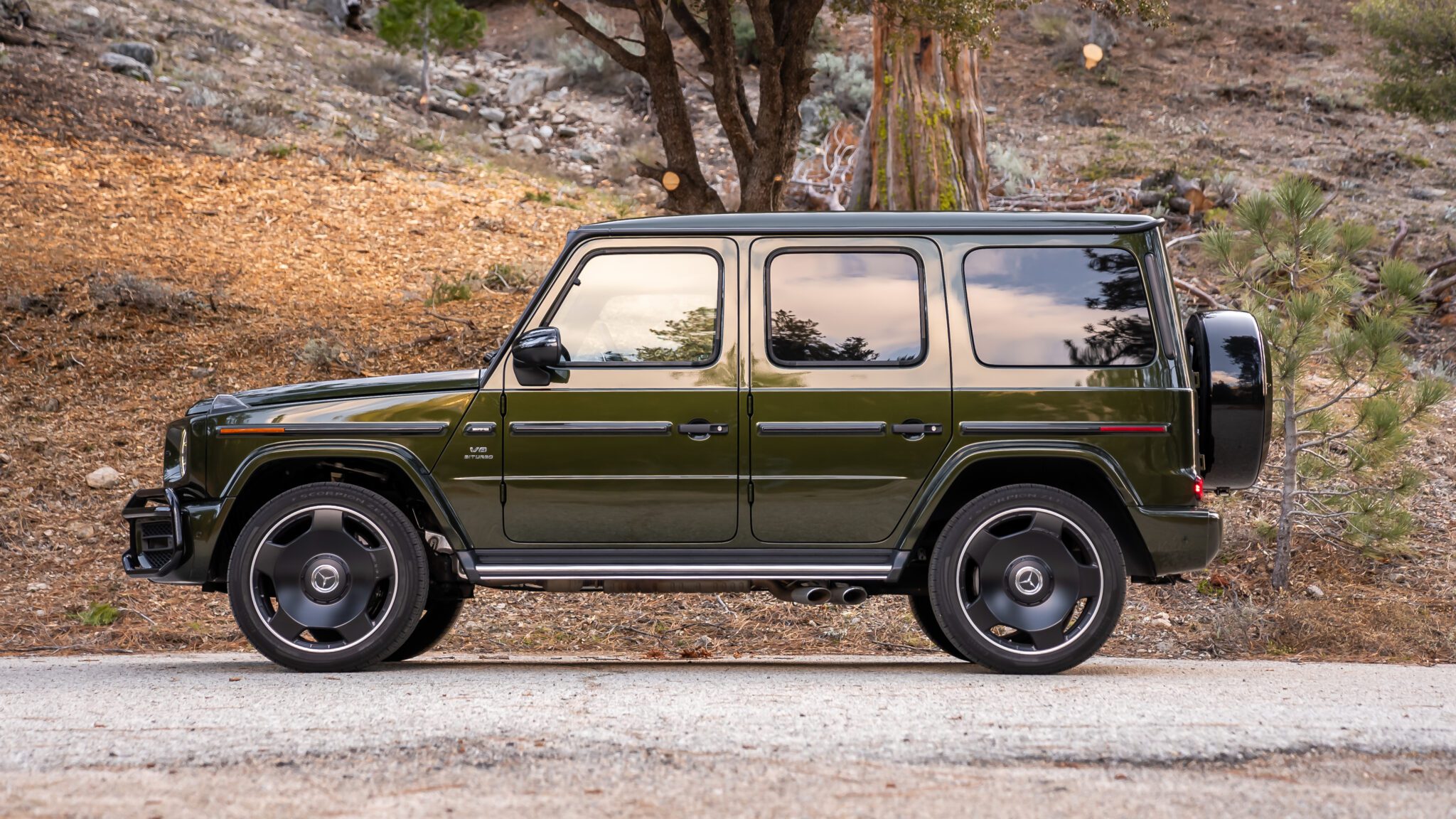 An image of a Mercedes-AMG G63 parked outdoors.