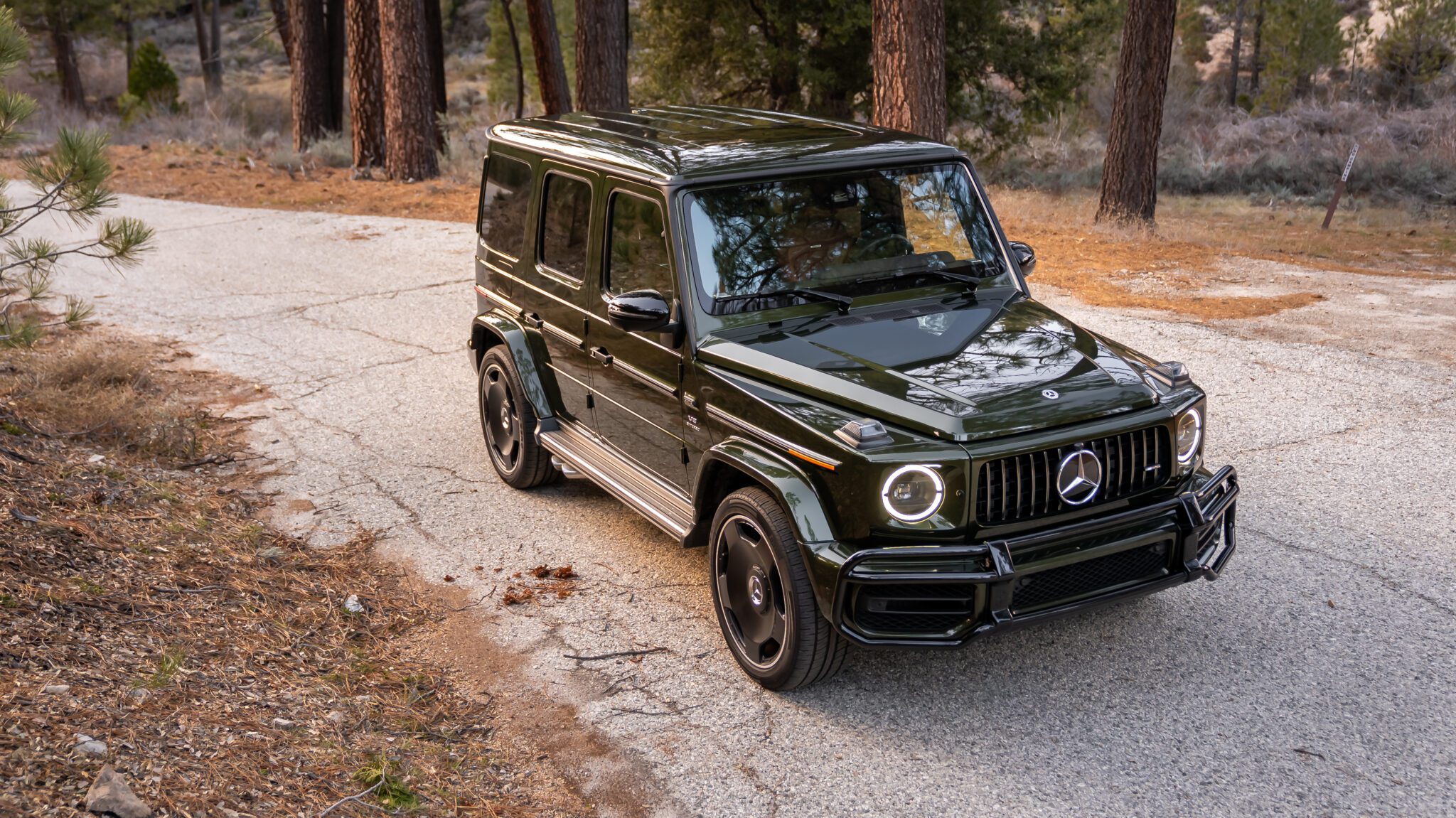 An image of a Mercedes-AMG G63 parked outdoors.