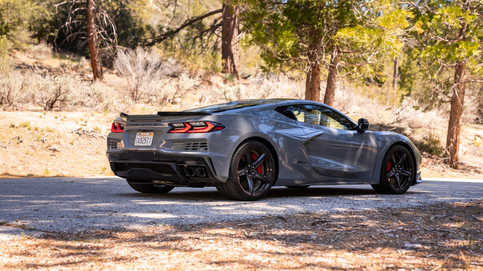 An image of a 2024 Chevrolet Corvette E-Ray parked outdoors.