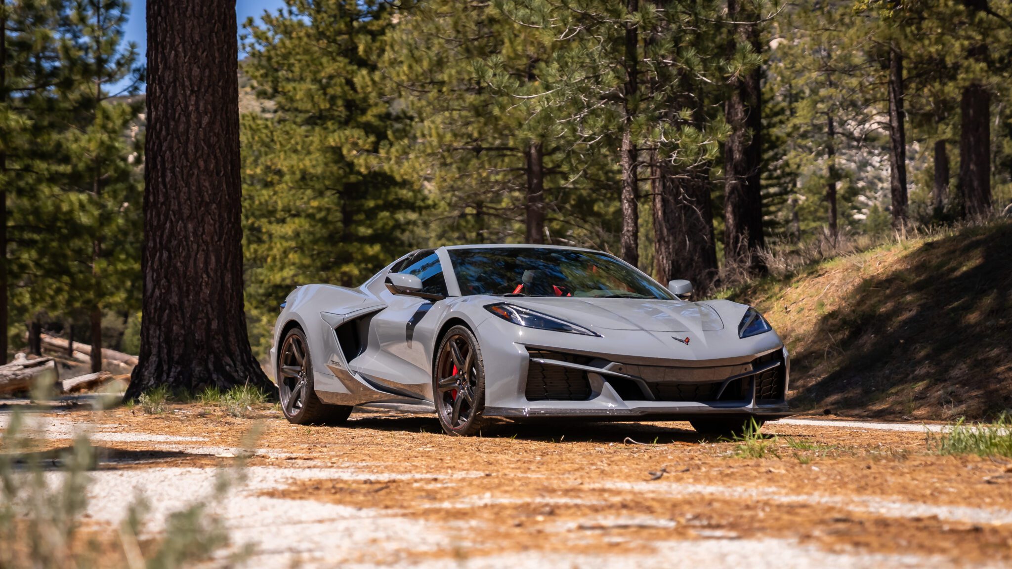 An image of a 2024 Chevrolet Corvette E-Ray parked outdoors.