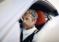 Patrick Dempsey behind the wheel of a Porsche