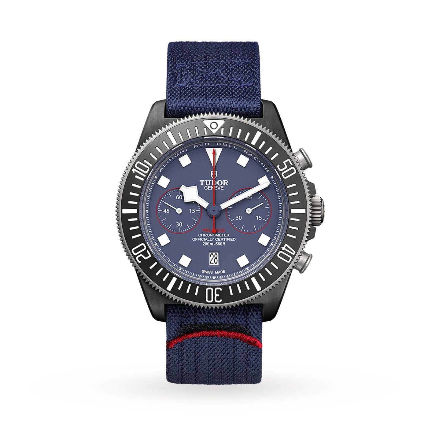 A Tudor wristwatch with a blue dial and fabric strap, black bezel, silver hands, and white hour markers evokes the precision of automotive engineering found in luxury chronographs, shown against a plain white background.