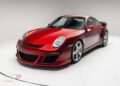 An ultra-rare 2012 RUF Rt 12 R in red is parked in a white studio with a clean background, facing slightly to the right.