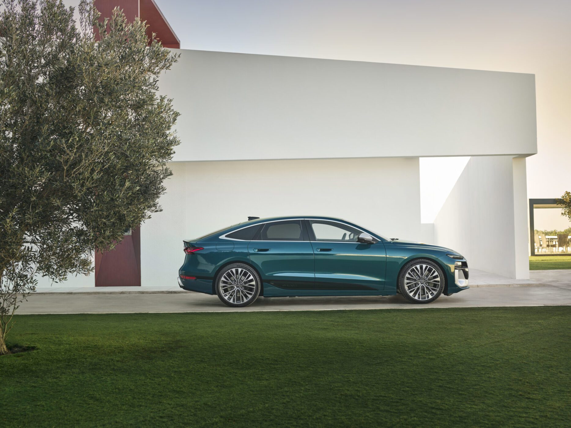 An image of an Audi S6 e-tron Sportback parked outdoors.