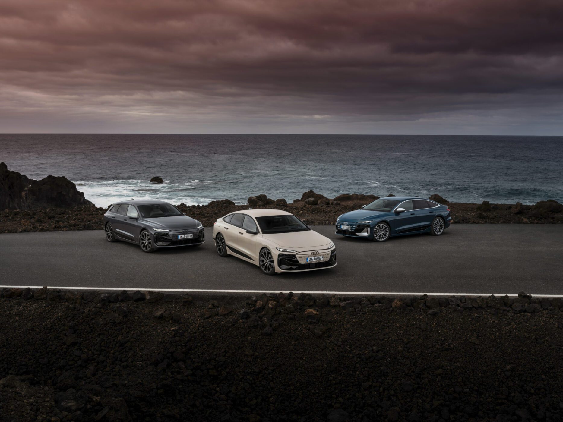 An image of three cars parked outdoors.