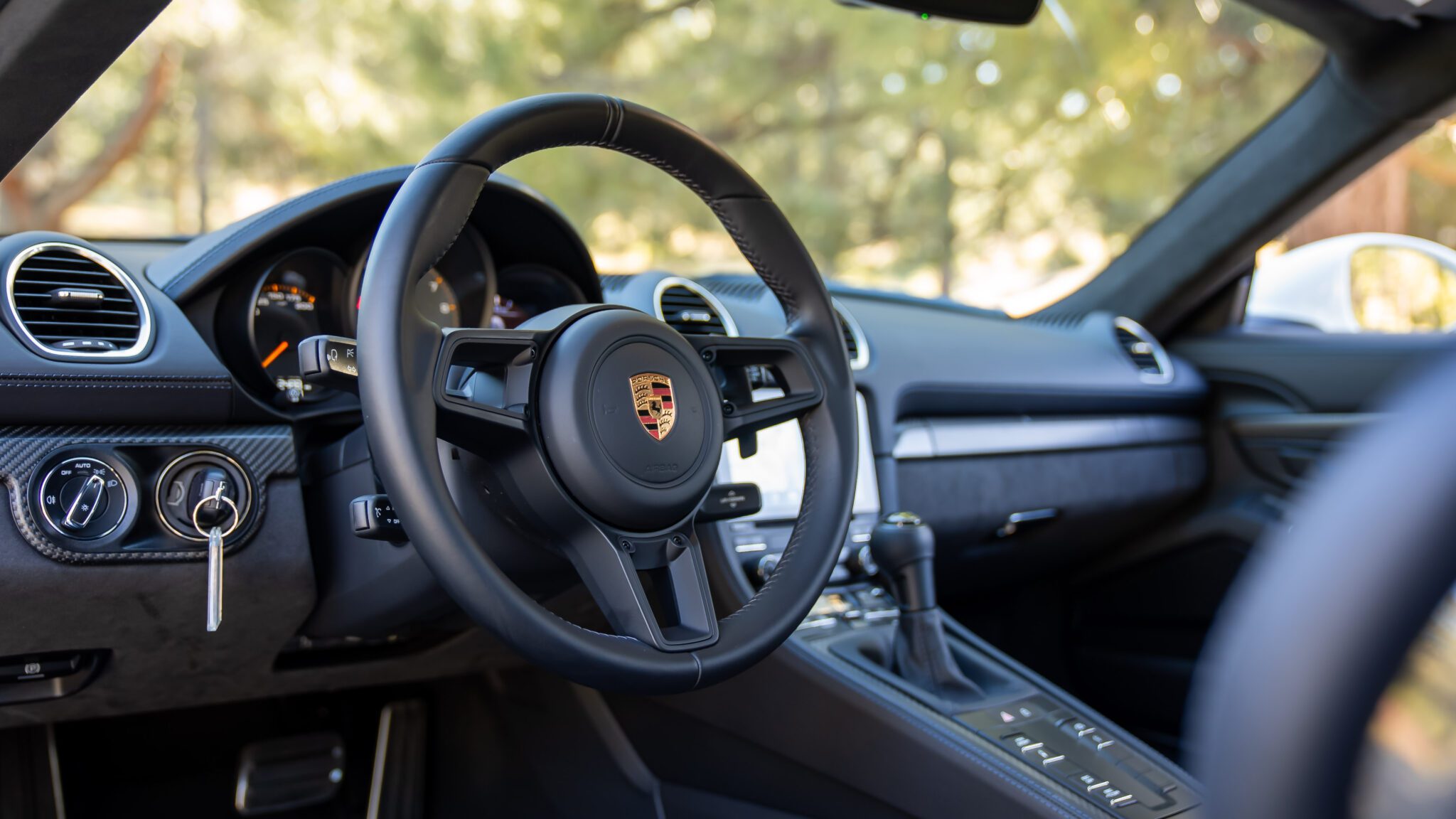 An image of a car's steering wheel.
