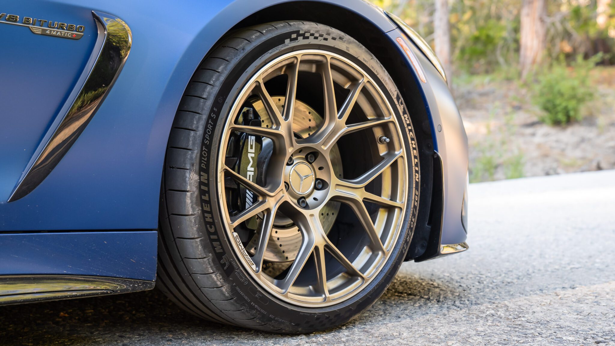 A close-up image of a car's wheel.