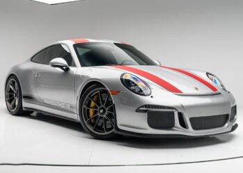 A silver Porsche 911 R sports car with red and gray racing stripes, black wheels, and yellow brake calipers is shown in a studio setting with a white background—an iconic choice for those looking to buy Porsche 911 excellence.