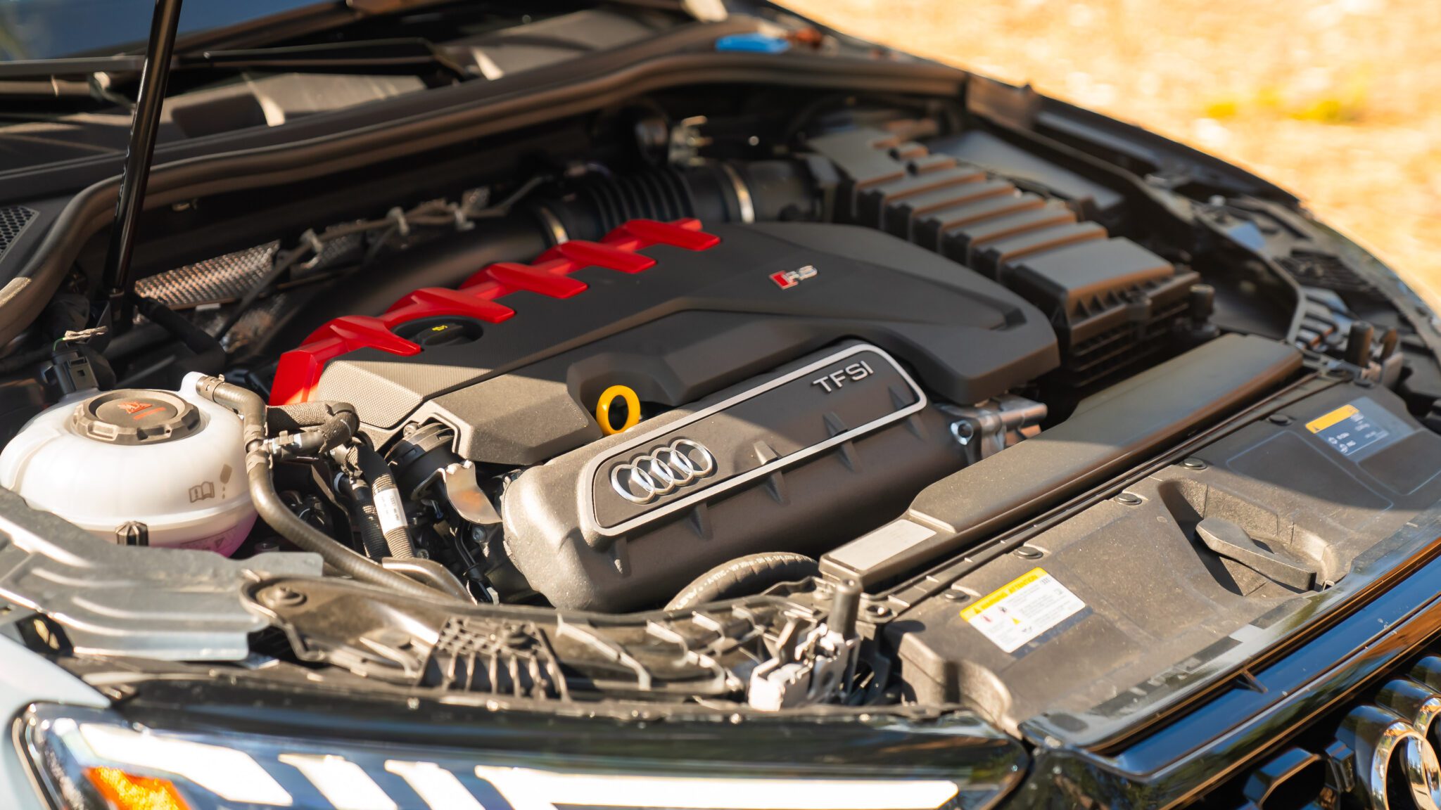 A close-up shot of a car's engine bay.